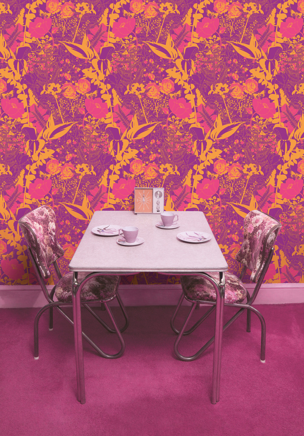 Cool retro 1960s wallpaper by Dupenny. Purple, magenta and orange floral pattern for walls