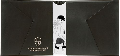 Black leather product packaging with a white illustration of a woman wearing a black hat and skirt, featuring the brand 'BK'.