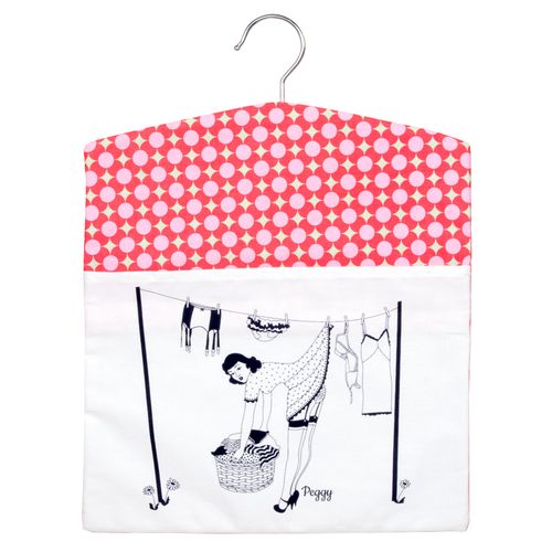 Hanger peg bag with pink polka dot top and white bottom featuring a design of a woman doing laundry.